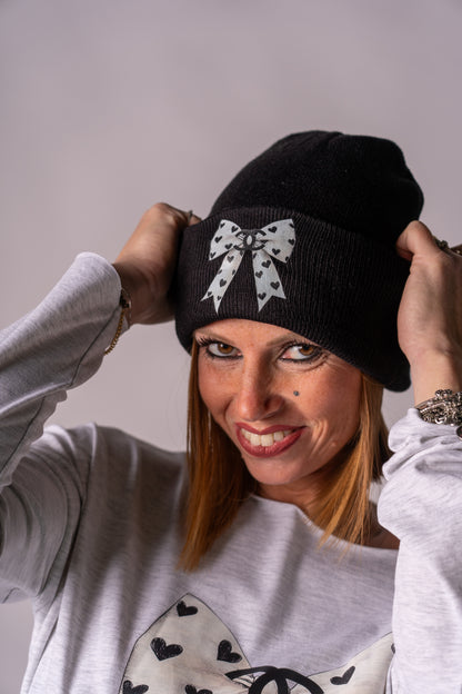 CAPPELLO FIOCCOSO C**NEL!